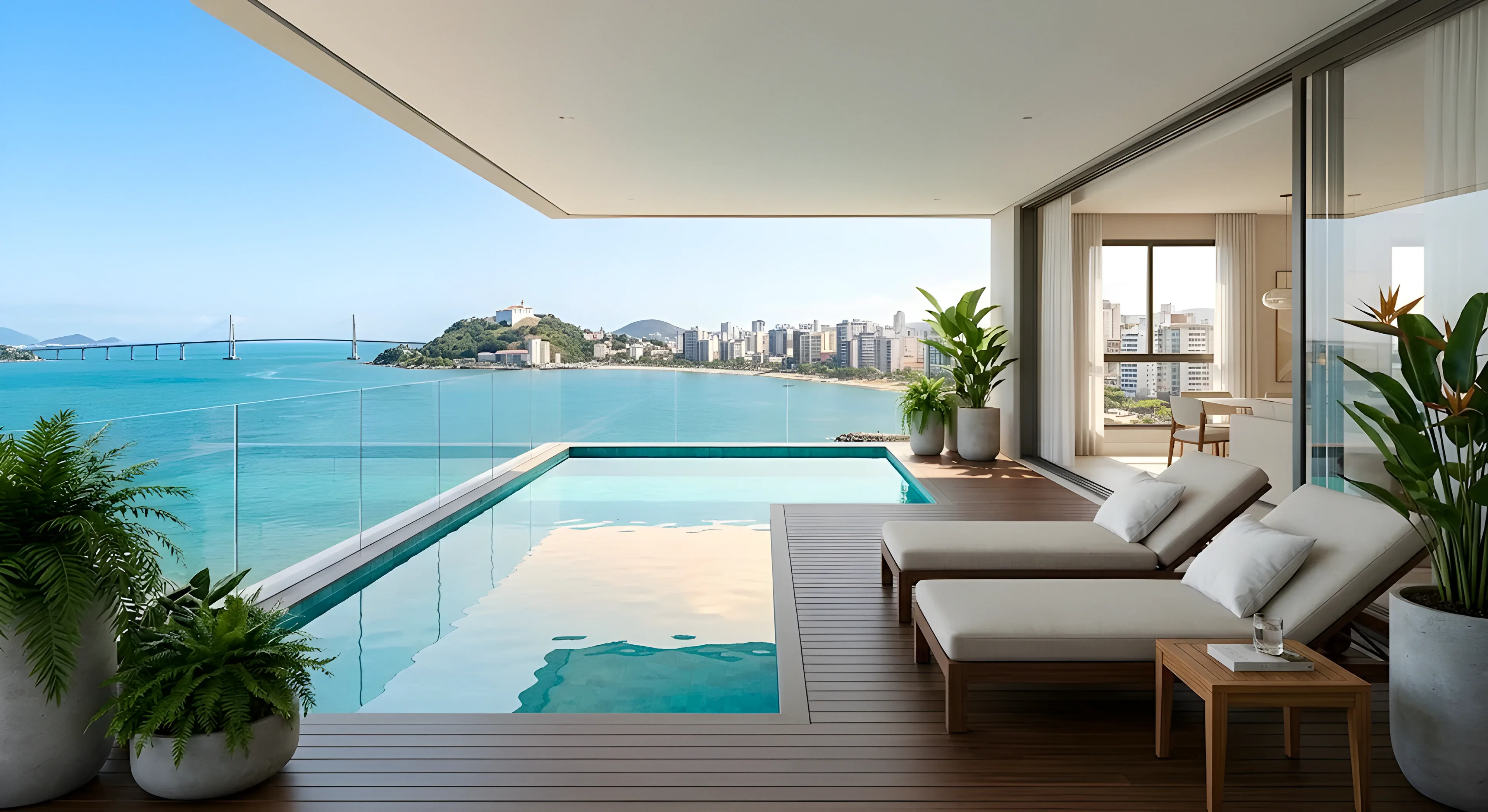 Cobertura com piscina de borda infinita e vista para o mar e a Terceira Ponte, em Vitória (ES)